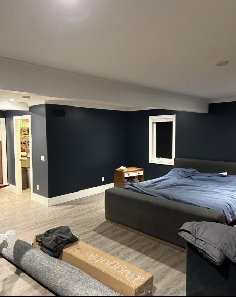 Bedroom after — deep navy blue