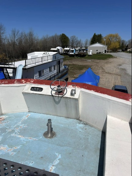 Boat deck before — worn and oxidized