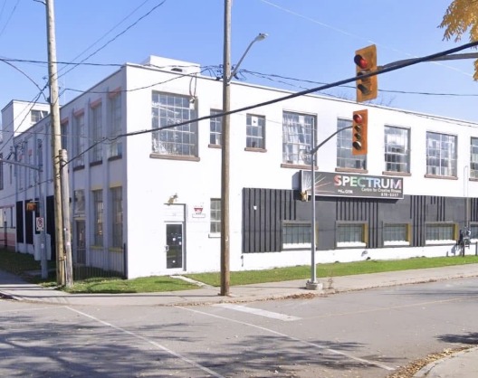 Commercial building before — white masonry