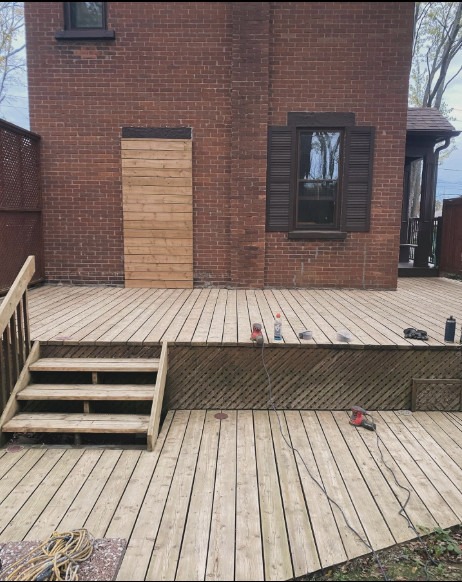 Deck before — weathered natural wood