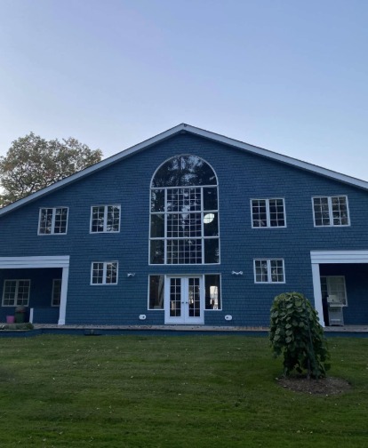 Large blue painted home exterior