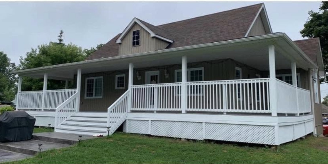 Porch railing after — painted white