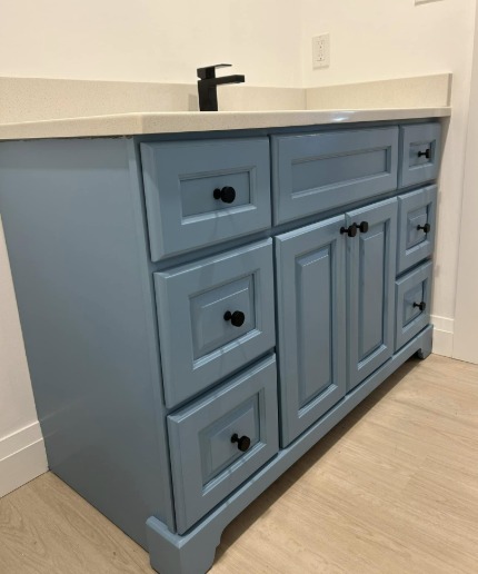 Bathroom vanity refinished in slate blue